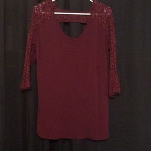 3/4 Women’s blouse. Sleeves are partly laced.